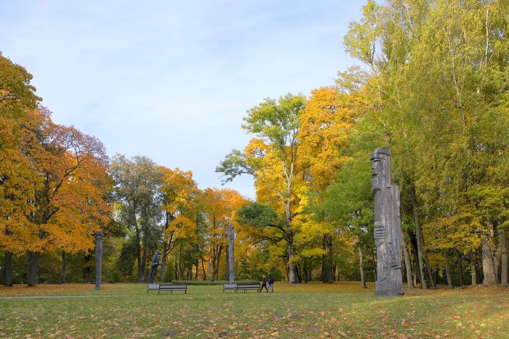 Wooden Sculptures in Lielvārde Park in the Autumn Sun