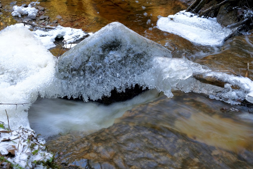 Frozen Stone in the River