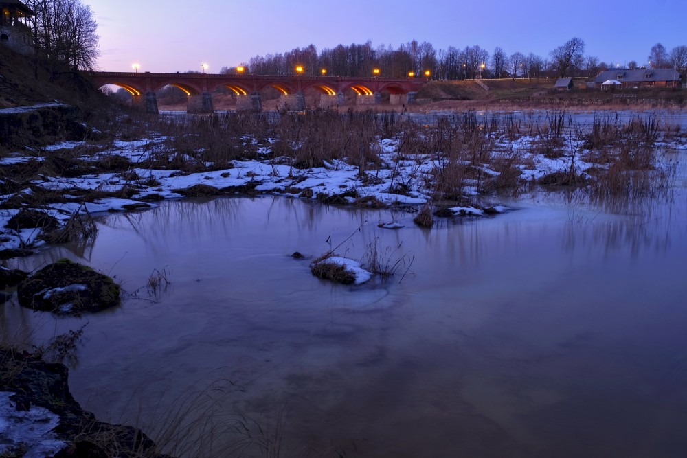 Brick Bridge across the Venta river in winter