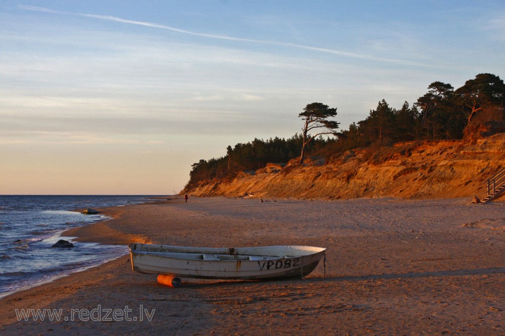 Steep coastline of Staldzene at sunset