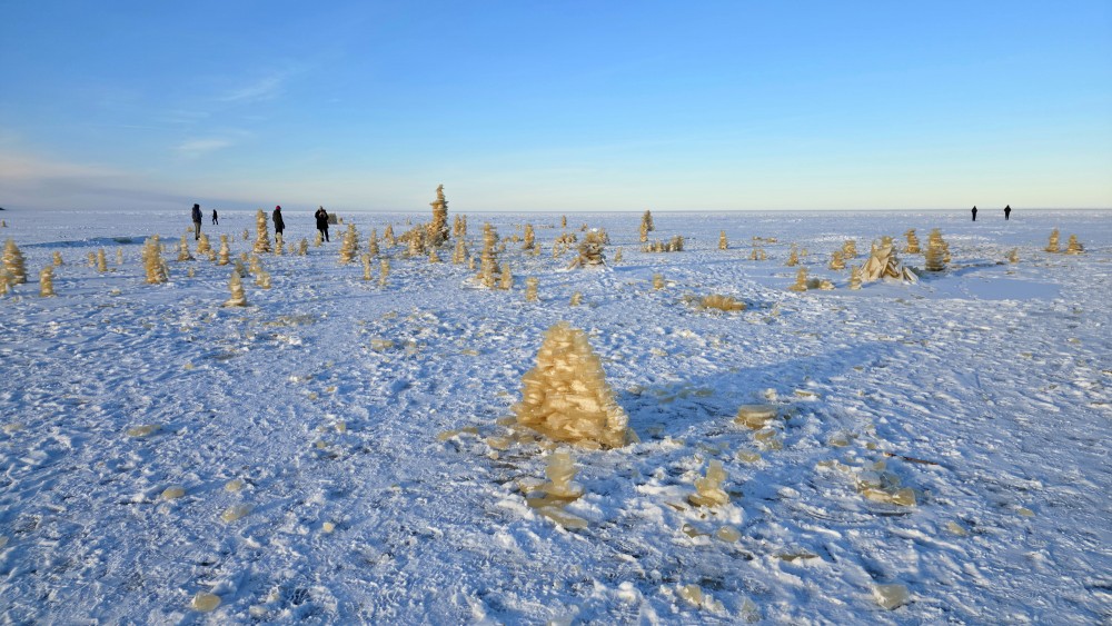 Ice piles and man-made ice towers at Bigauņciems Beach