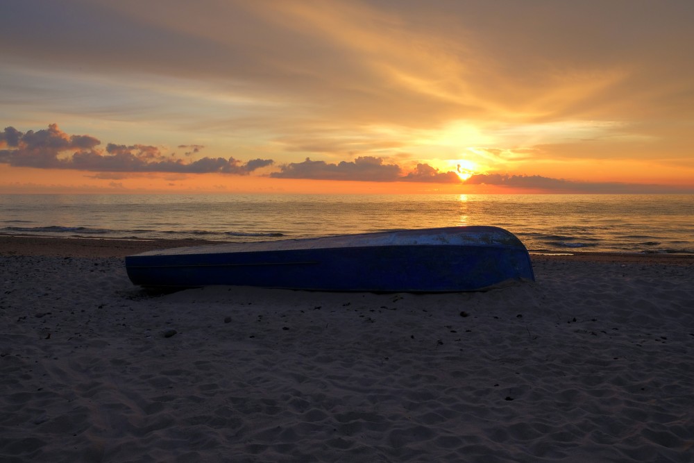 Boat on the Beach at Sunset