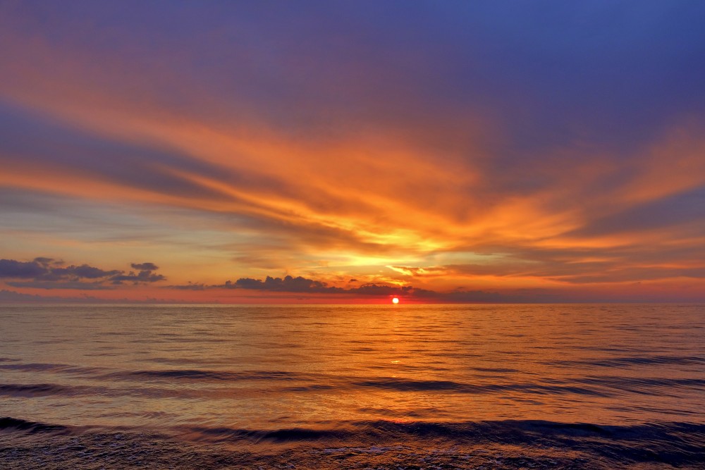 Saulriets jūrā