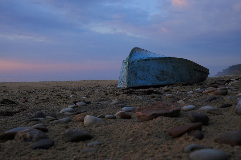 Boat on the Beach at Sunset