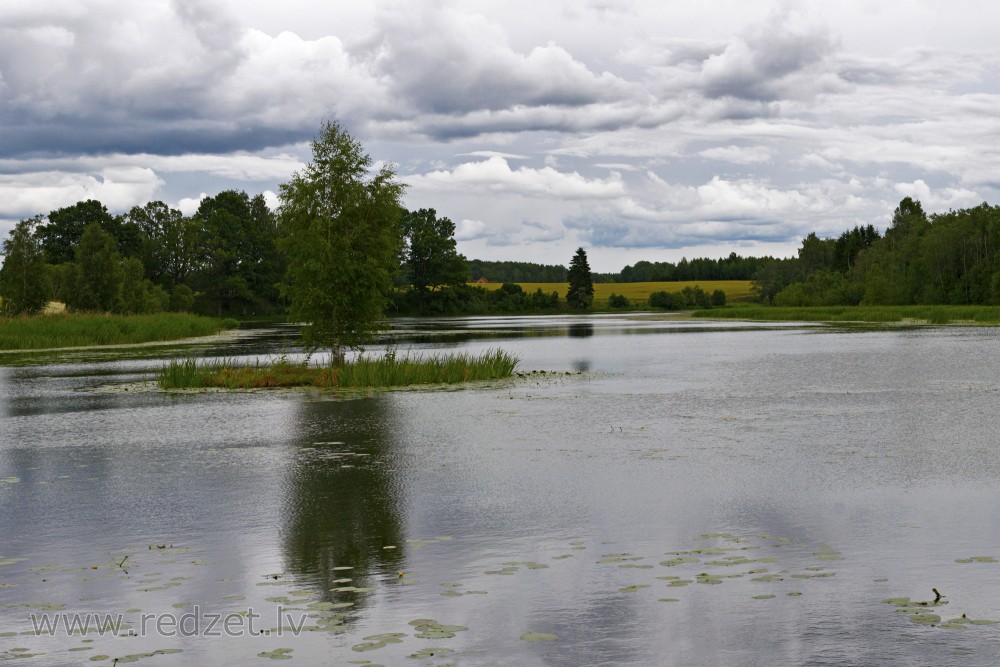 Skedes water mill Lake, Latvia