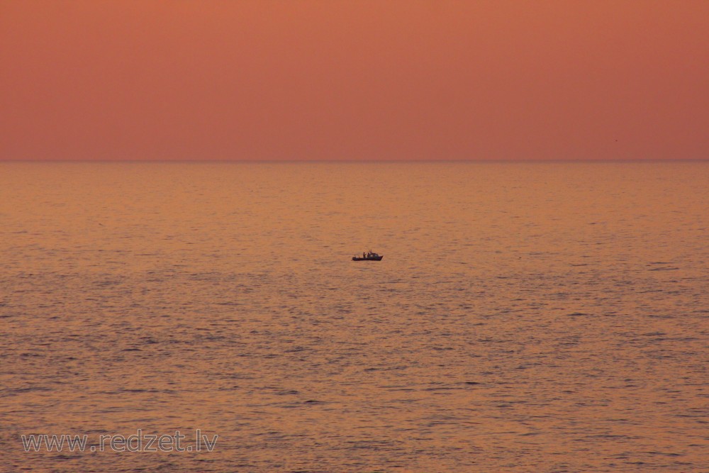 Small Boat in the Ocean