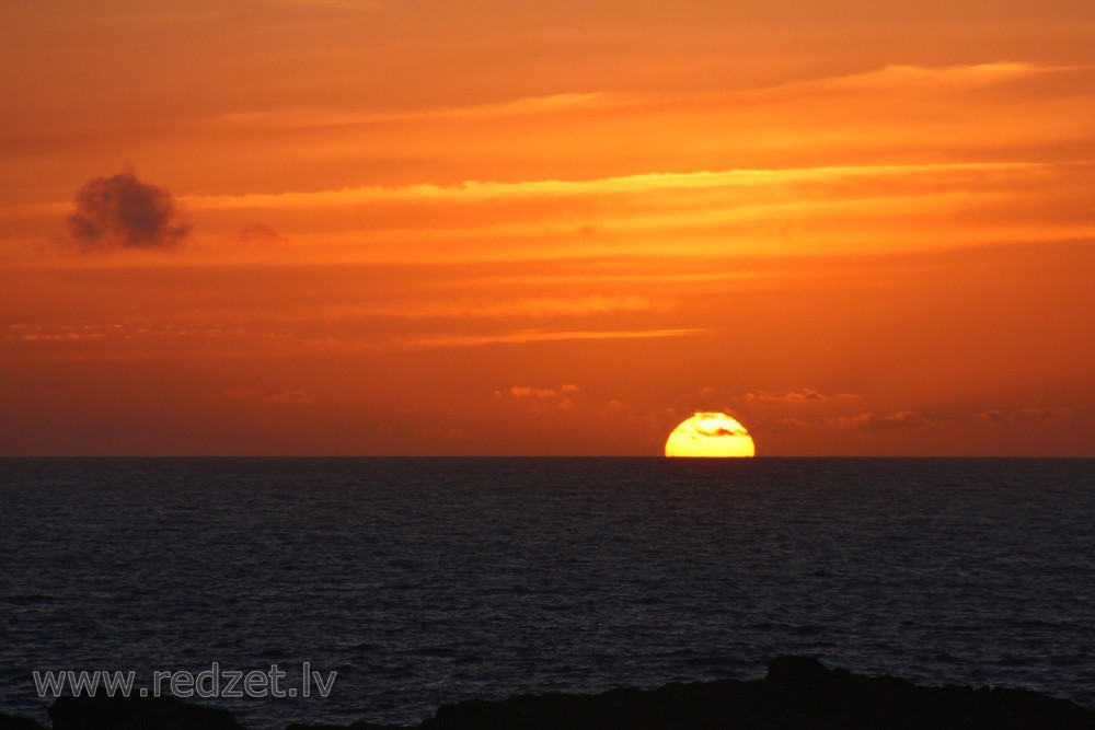 Sun Sinking Into The Ocean