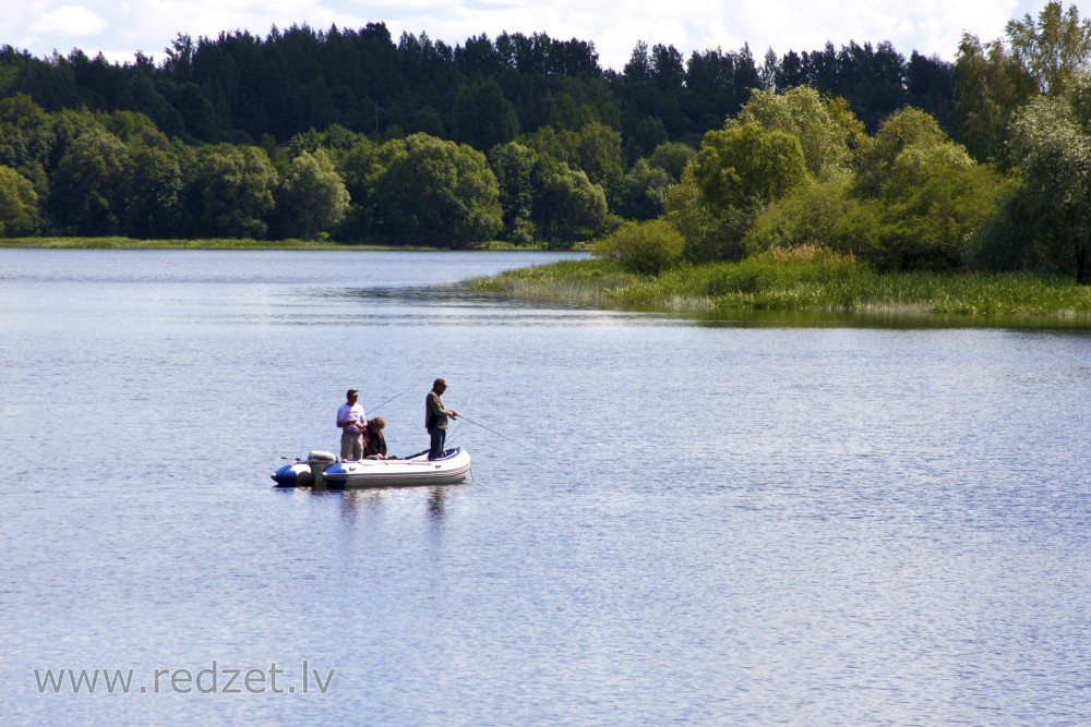 Anglers in a Boat on the River Daugava
