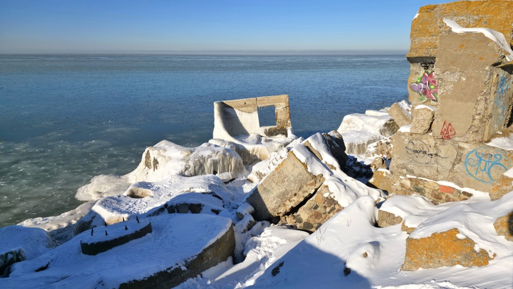 Ruins of Liepaja northern forts in snow by the sea
