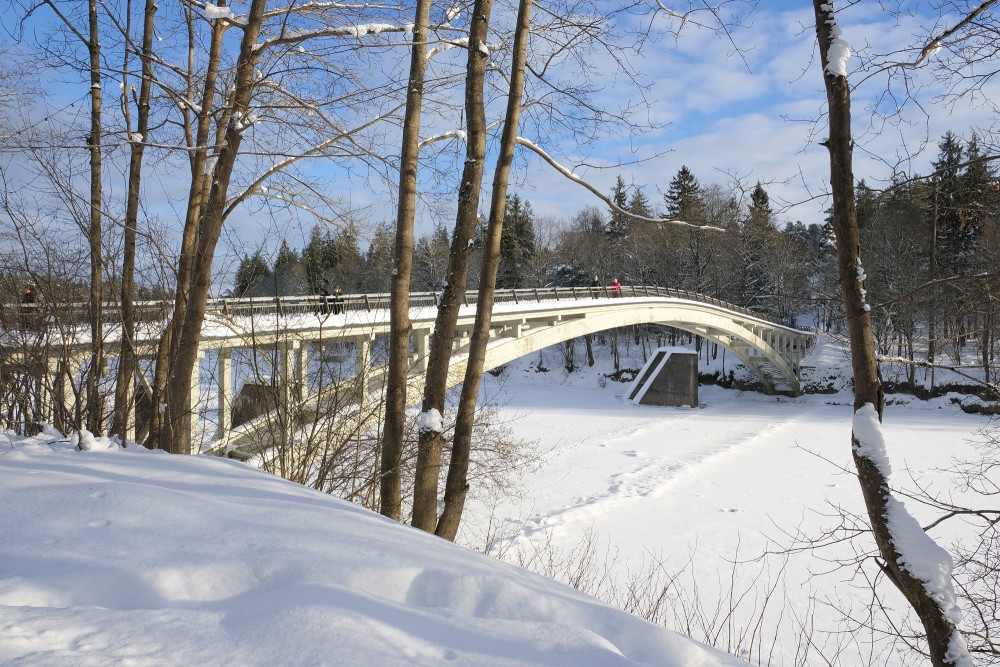Pedestrian Bridge over the Ogre River in Winter