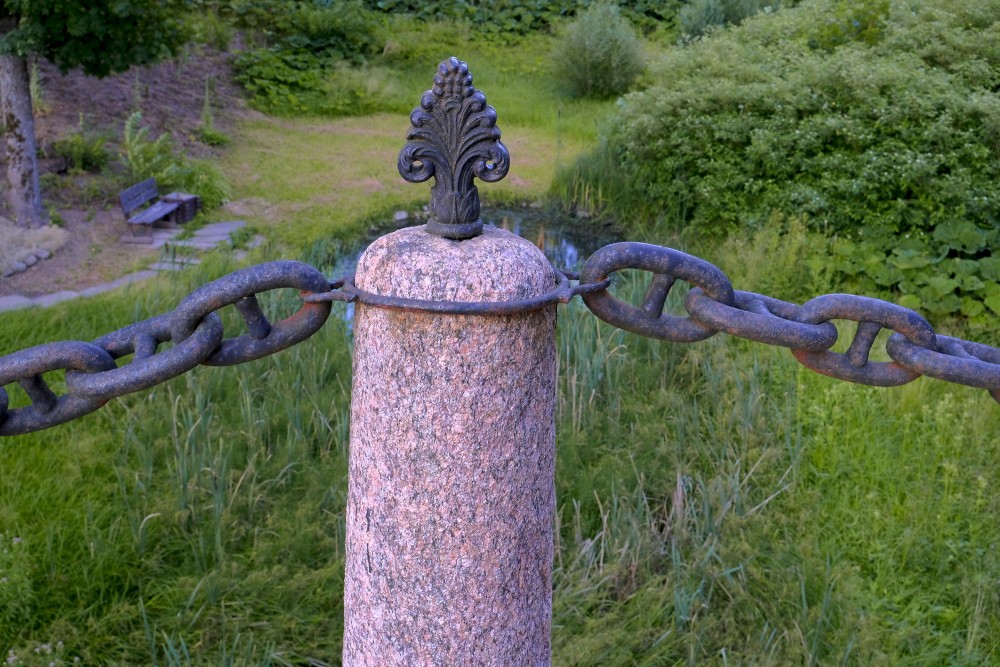 Granite Posts with Iron Chains and Decorations (Kazdanga Stone Bridge)