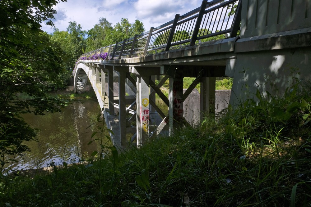 Arched Pedestrian Bridge over the Ogre River