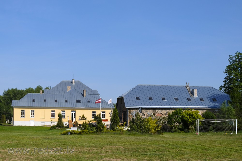 Renovated Brukna Manor and One of Granaries