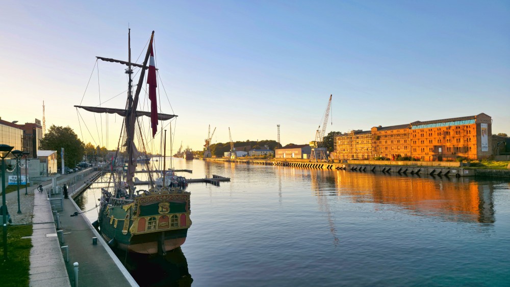 View of Liepaja Trade Canal and Sailing Ship Libava in Evening Light View of Liepaja Trade Canal and Sailing Ship Libava in Evening Light