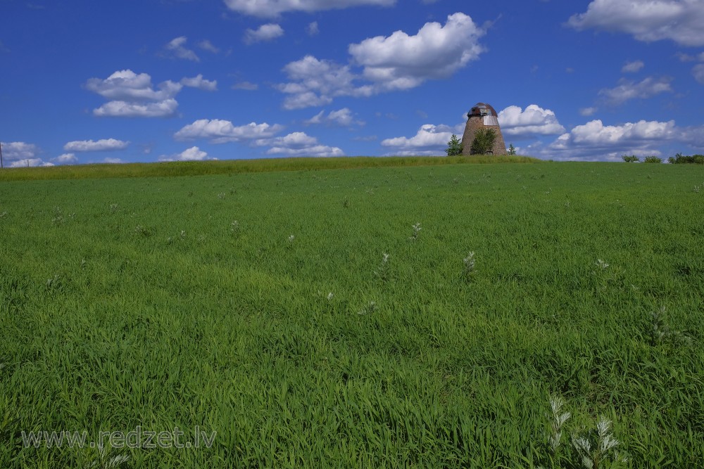 Rural Landscape With Ive Windmill