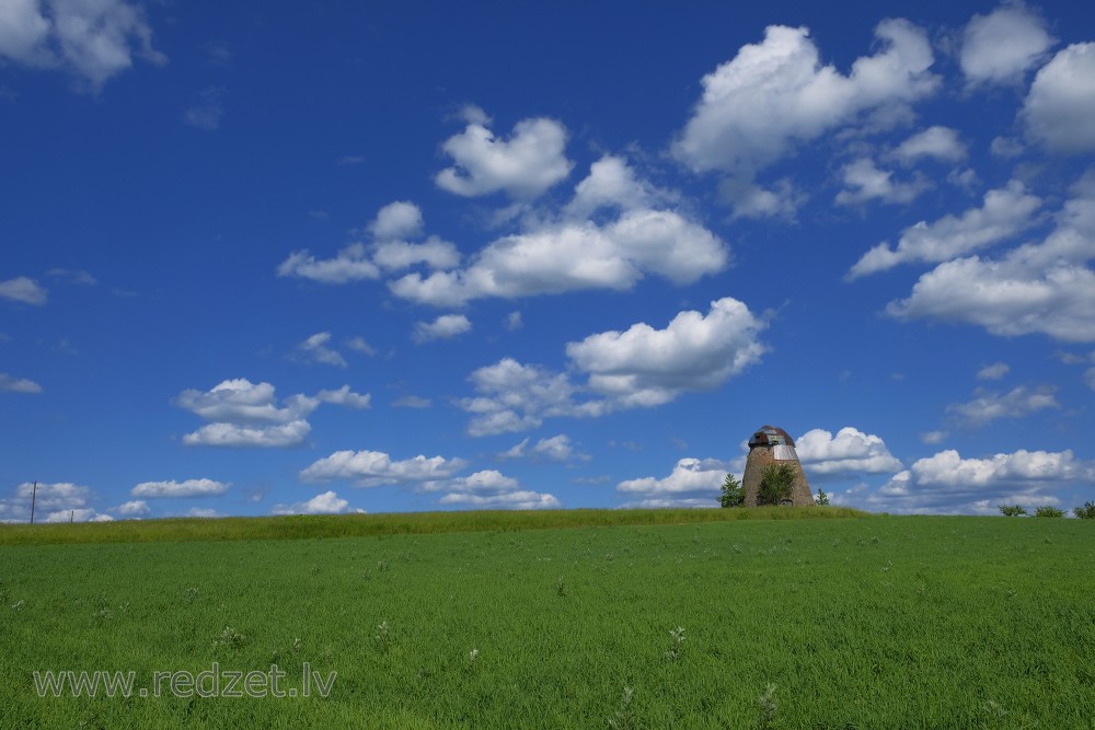 Rural Landscape, Cumulus cloud And Ive Windmill