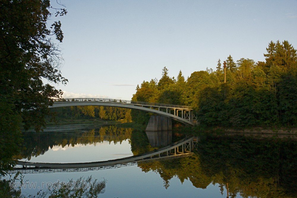 Arched Pedestrian Bridge over the Ogre River