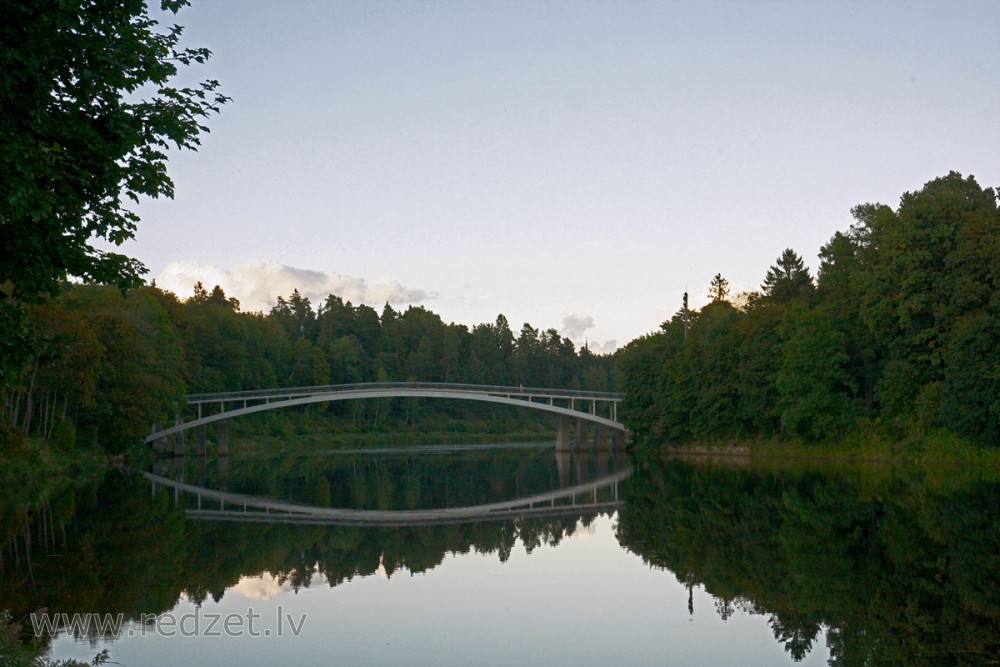 Arched Pedestrian Bridge over the Ogre River
