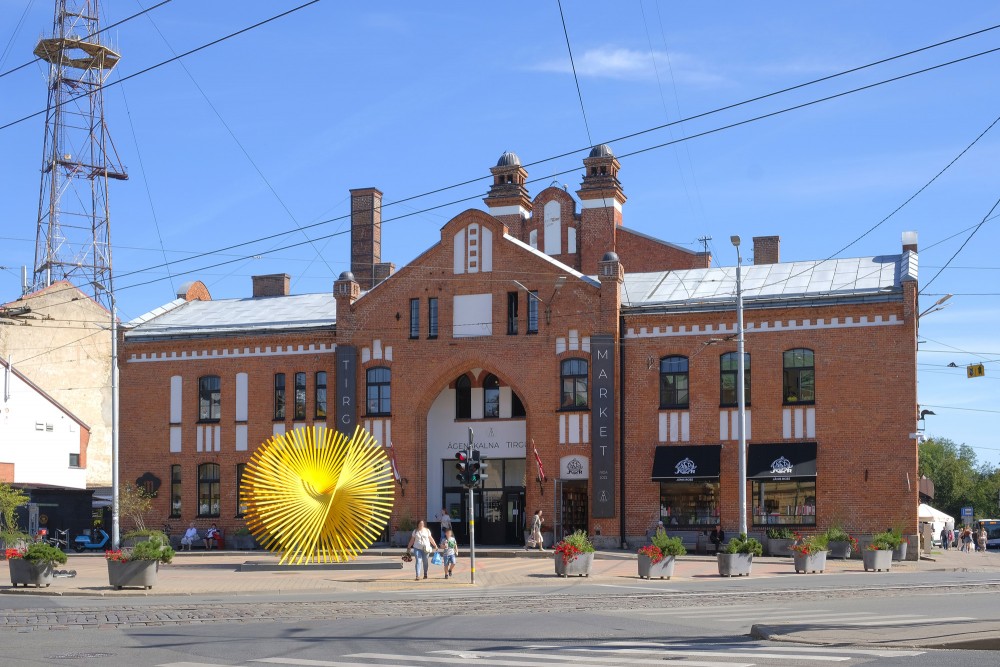 Side view of Āgenskalns Market building with historic brick volume