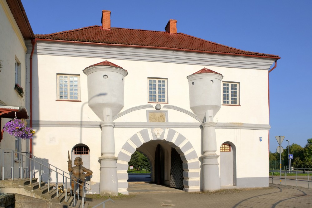 The historic Swedish Gate in Priekule on a sunny day