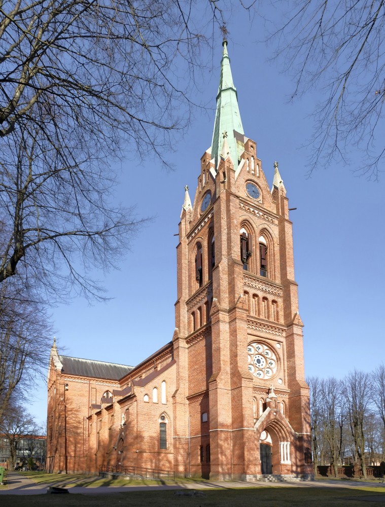 Church of the Assumption of the Virgin Mary in Palanga with brick tower and spire