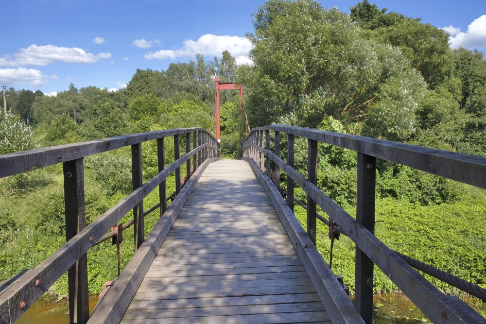 Perspective view along a suspension bridge pedestrian deck Perspective view along a suspension bridge pedestrian deck