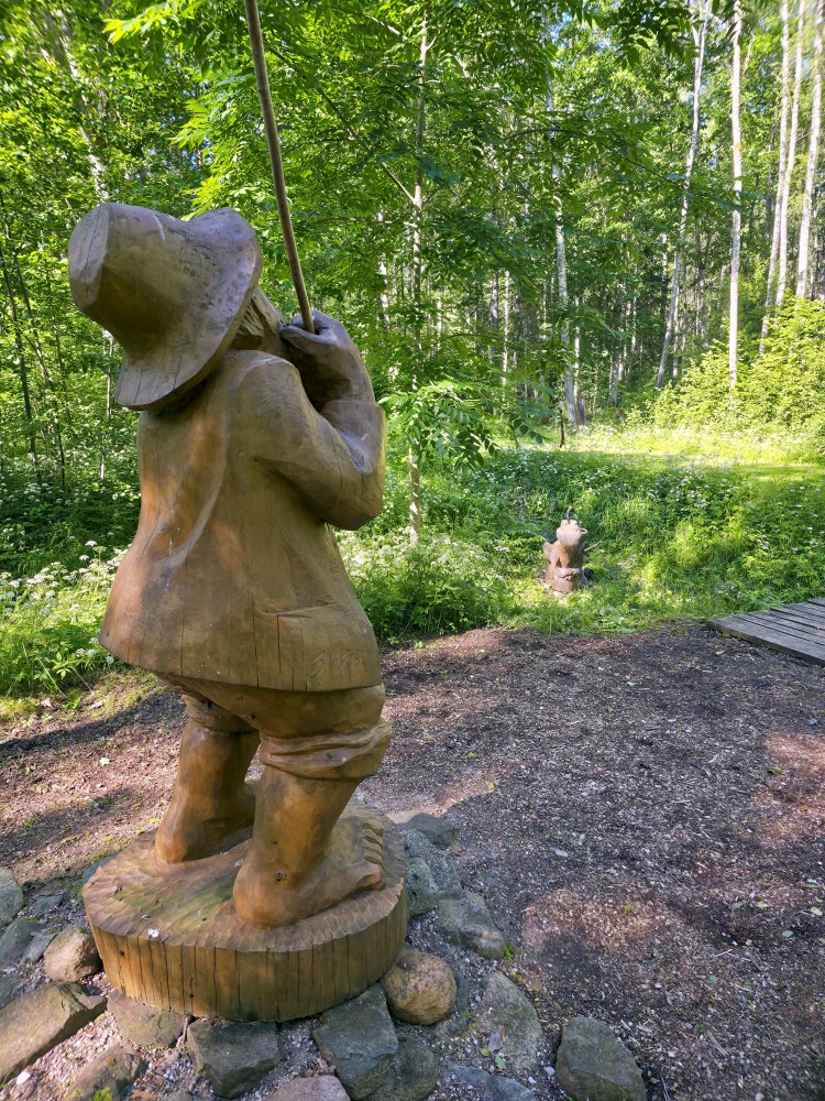 Fisherman Sculpture In Cīrava Forest Park