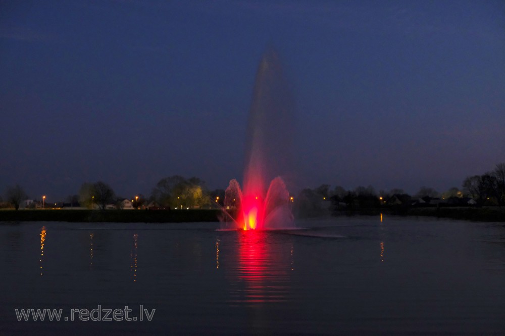 Fountain in Reņķa Garden Pond in Night