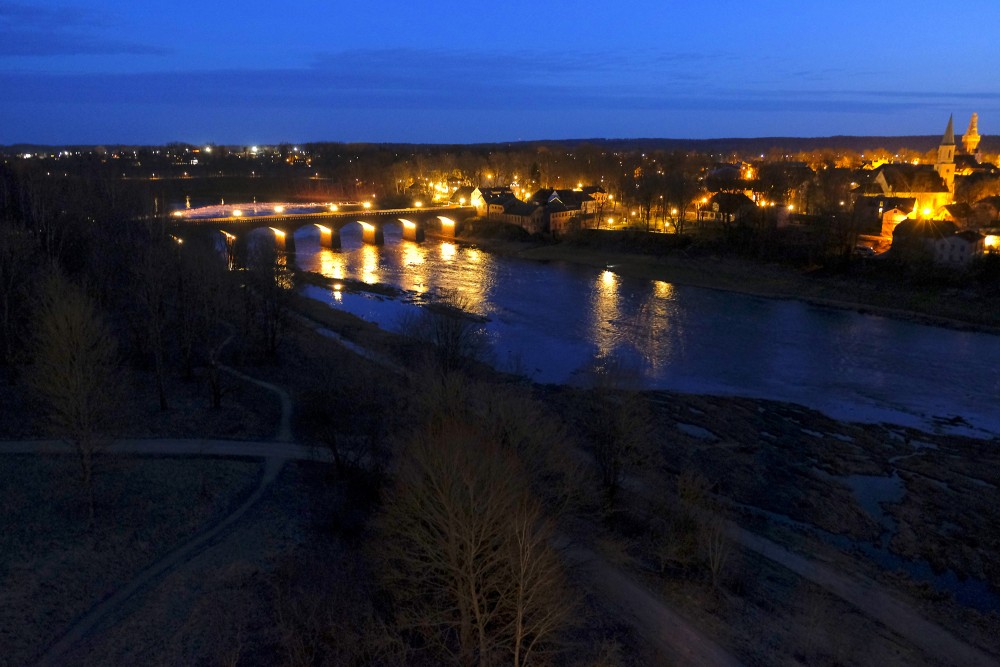 View of Kuldīga at Night from the View Tower