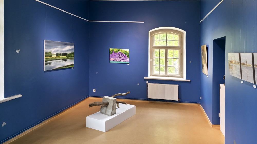 Art exhibition at the Daugava Museum with blue walls