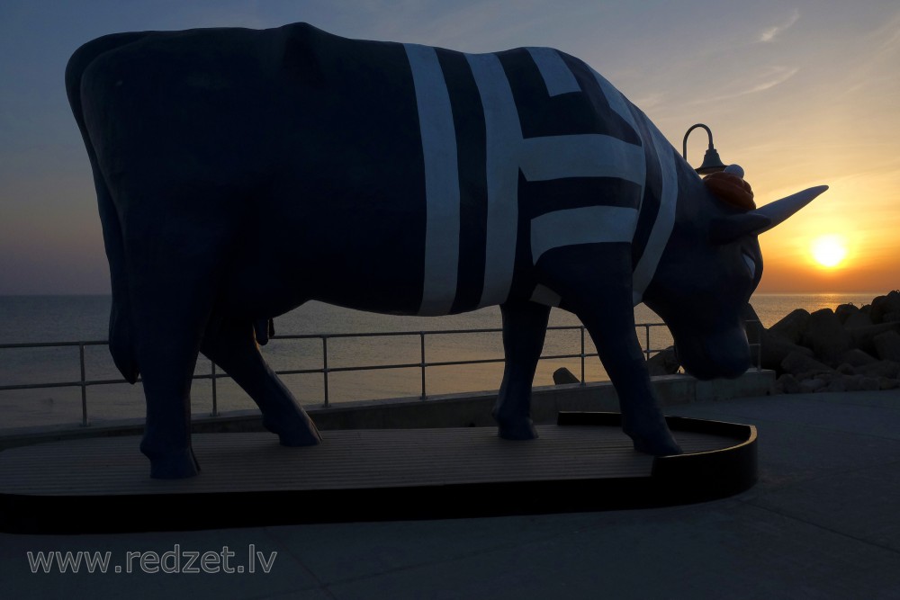 Sculpture "Cow Seaman" in Sunset