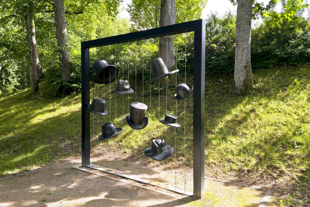 Art installation Hats on a green park slope in Talsi Art installation Hats on a green park slope in Talsi