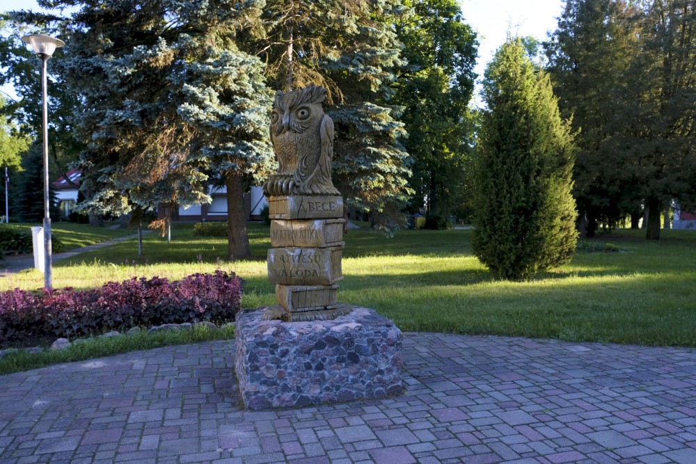 The symbol of the Staļģene school is an owl carved in a wood