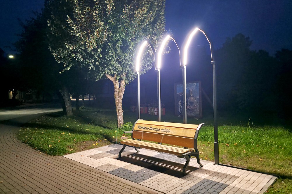 Aizpute Tālivaldis Deksnis musical bench and illuminated arches at night Aizpute Tālivaldis Deksnis musical bench and illuminated arches at night
