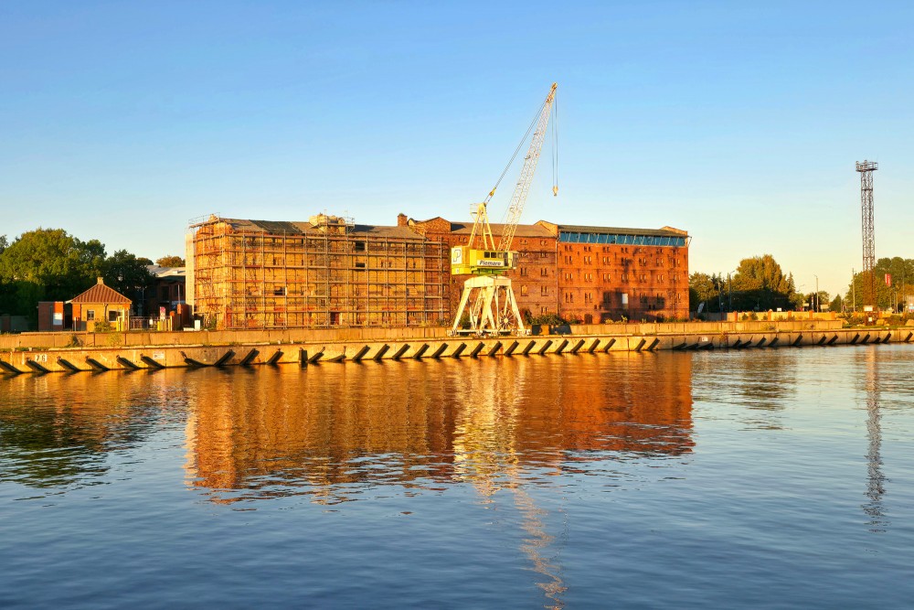Liepaja Trade Canal with Construction Crane and Buildings