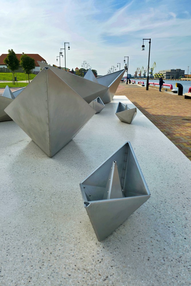 Metal boat sculptures on Ventspils port street promenade
