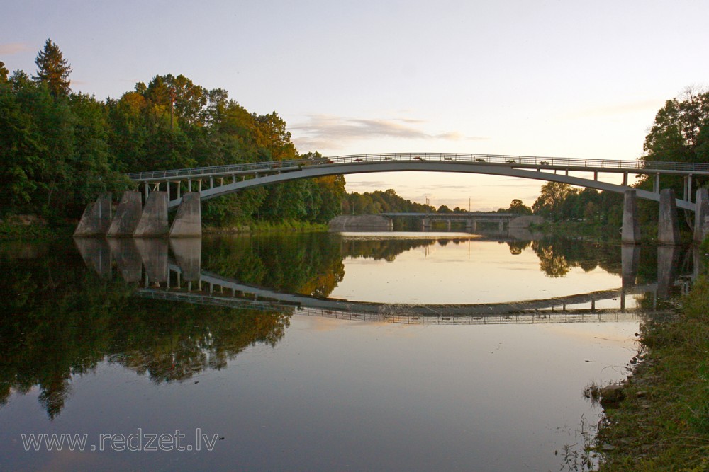 Arched Pedestrian Bridge over the Ogre River
