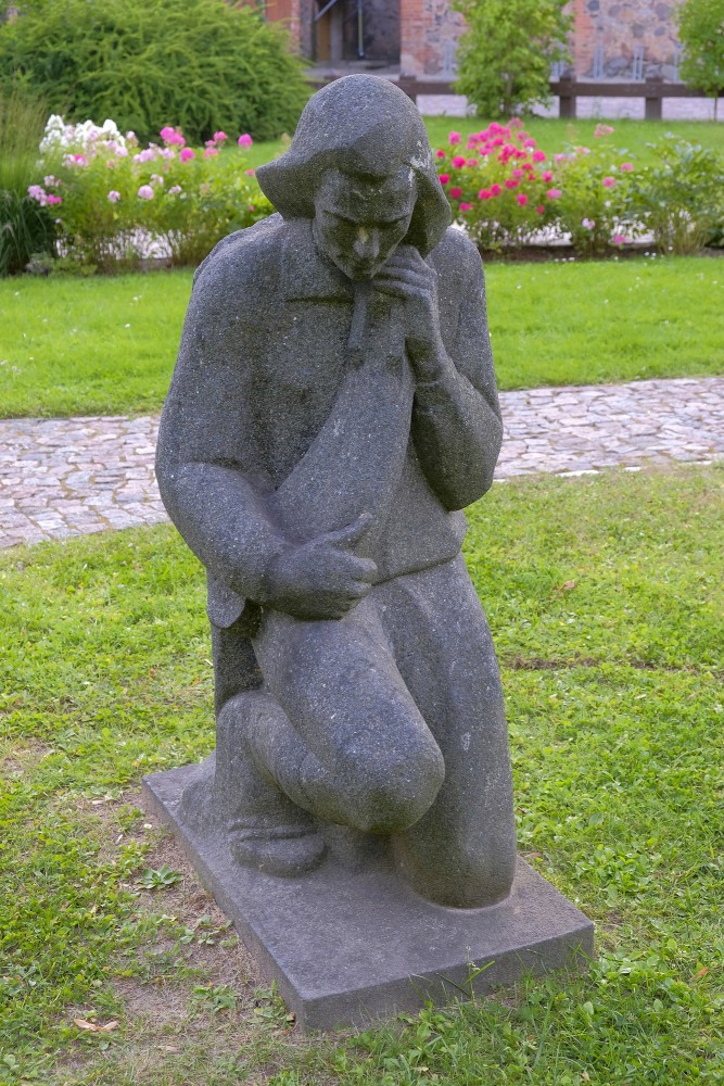 L. Rezevskas skulptūra "Spēlmanītis Tots" (1987)