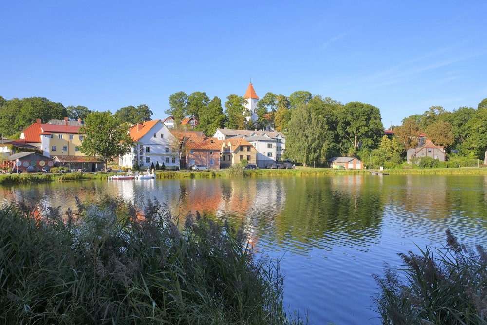 Talsi lake view with town buildings and church tower Talsi lake view with town buildings and church tower