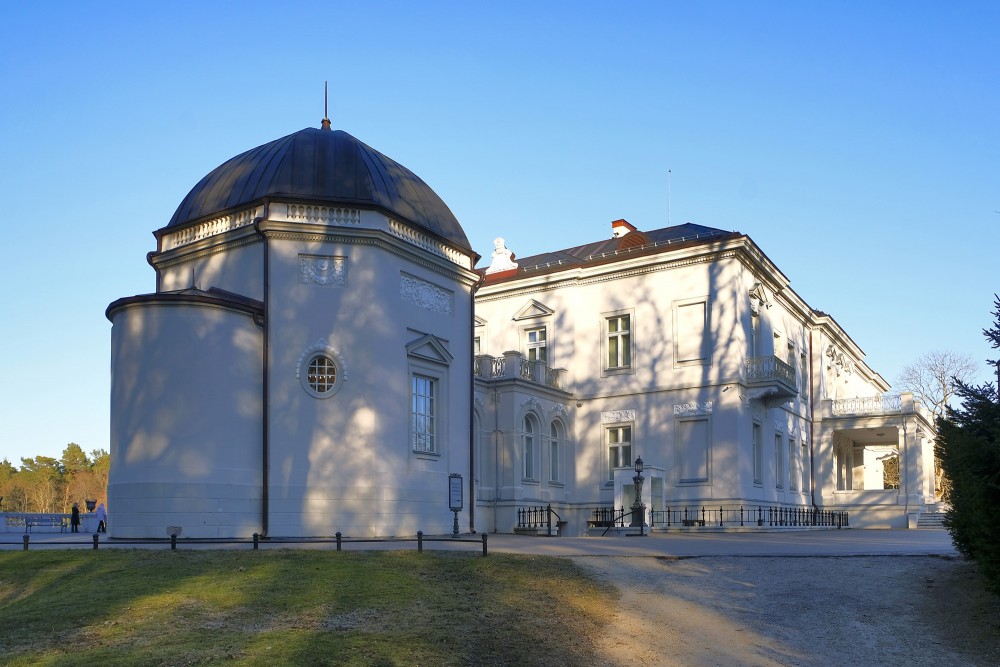 Palanga Amber Museum building with a dome and park scenery