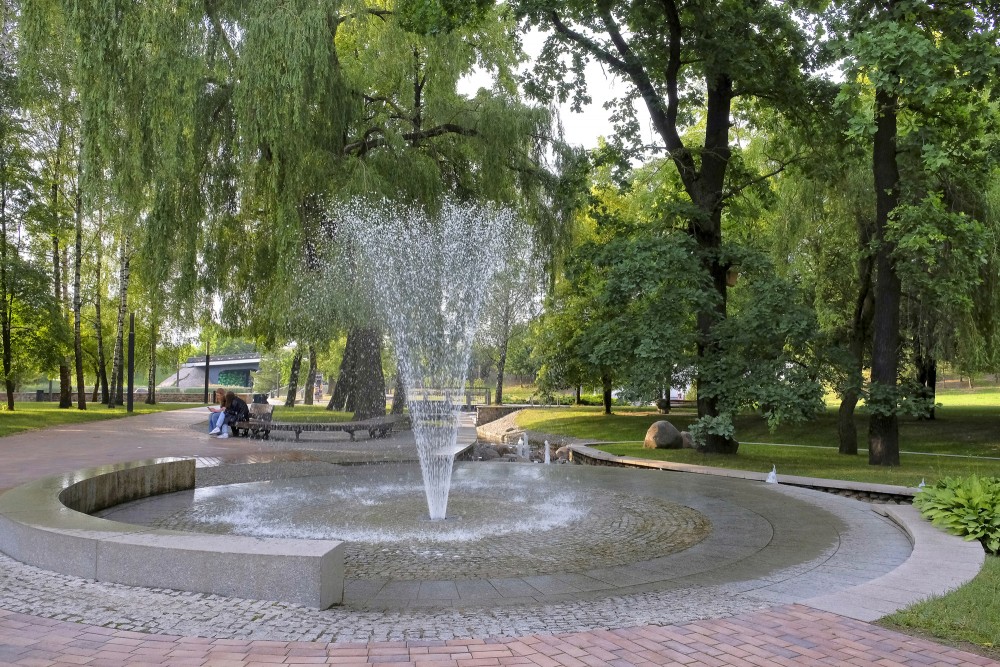 Water fountain and pedestrian path in Marijampole Poetry Park
