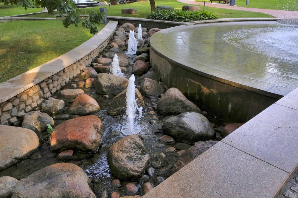 Stream with small-scale fountains in Marijampole Poetry Park