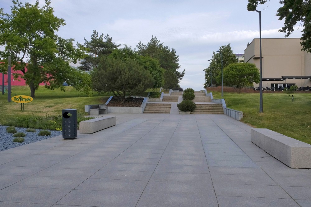 Modern paved walkway and steps in Marijampolė Poetry Park