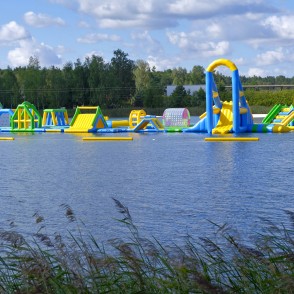 Inflatable water park on the Ozolnieki lake Inflatable water park on the Ozolnieki lake
