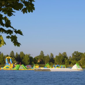 Inflatable water park on the Ozolnieki lake Inflatable water park on the Ozolnieki lake